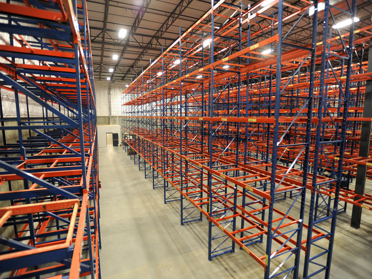 What impact has the emergence of storage racks brought to the modern production industry